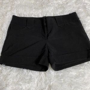 Black dress shorts with pockets. Size Medium.